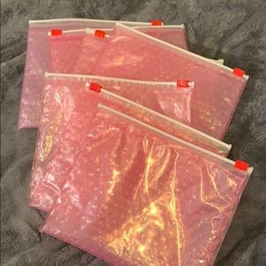6 medium sized & 1 large glossier bags